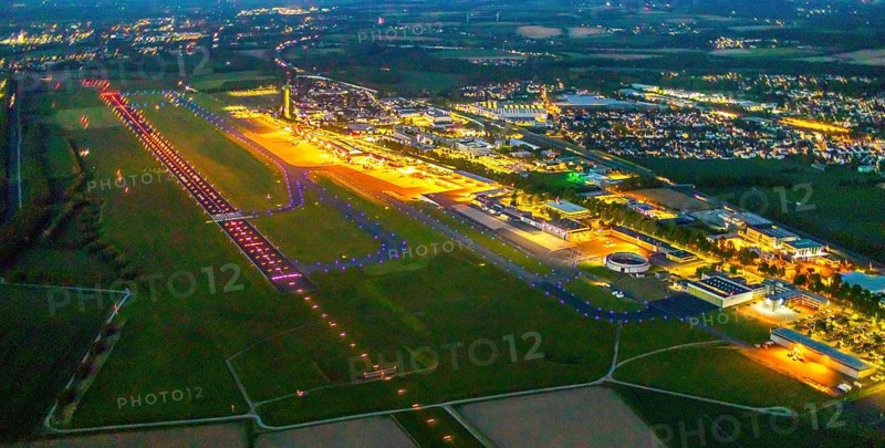 Aerial photo, Dortmund Airport, DTM, Wickede, Dortmund, Ruhr area, North Rhine-Westphalia, Germany, terminal building, DE, Dortmund Airport DTM, twilight photography, reception building, Europe, flight emission, airport, aircraft noise, airfield, runway, light pollution, aerial photograph, aerial photography, aerial photography, night, night photography, night flight, runway, overview, bird's-eye view, illuminated streets, birds-eyes view, nightflight, overview