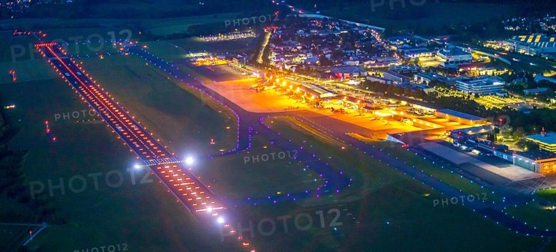 Aerial photo, Dortmund Airport, DTM, Wickede, Dortmund, Ruhr area, North Rhine-Westphalia, Germany, terminal building, DE, Dortmund Airport DTM, twilight photography, reception building, Europe, flight emission, airport, aircraft noise, airfield, runway, light pollution, aerial photograph, aerial photography, aerial photography, night, night photography, night flight, runway, overview, bird's-eye view, illuminated streets, birds-eyes view, nightflight, overview