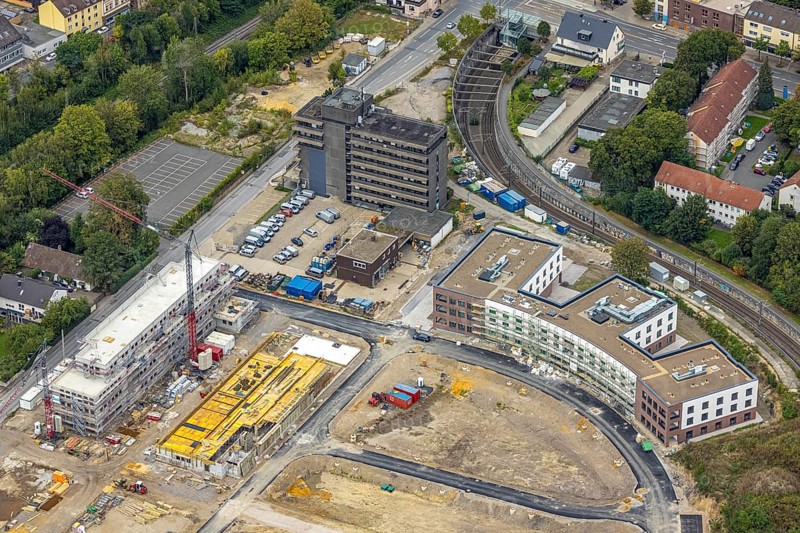 Aerial view, construction site Hombrucher Bogen for commercial areas and multi-family houses in the district Hombruch in Dortmund, Ruhr area, North Rhine-Westphalia, Germany, construction work, construction area, construction site, building plots, construction project, construction site, DE, Dortmund, Europe, aerial view, aerial photography, aerial photography, new building, snow, overview, bird's eye view, colliery square, birds-eyes view, former prefabricated concrete plant at Luisenglück, overview