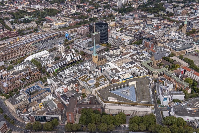 Aerial view, city centre with Thier Galerie, evangelic church St. Petri, central station Dortmund and black RWE Tower. Petri, Dortmund central station and black RWE Tower in the city district of Dortmund, Ruhr area, North Rhine-Westphalia, Germany, place of worship, railway station, DE, Deutsche Bahn AG, Dortmund, shopping centre, shopping mile, shopping square, shopping mall, Europe, religious community, place of worship, central station, main station, holy place, church, church community, denomination, aerial view, aerial photography, aerial photography, religion, religious site, shopping, shopping centre, overview, bird's eye view, birds-eyes view, overview