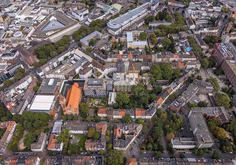 Aerial view, building site at St. Johannes Hospital and Church of Our Lady of the Holy Sepulchre in the district of Dorstfelder Brücke in Dortmund, Ruhr area, North Rhine-Westphalia, Germany, place of worship, construction work, construction area, building site, building plots, construction project, construction site, DE, Dortmund, Europe, health care, religious community, place of worship, holy place, hospital, church, parish, clinic, clinic centre, denomination, infirmary, hospital, aerial view, aerial photography, aerial photography, medical facility, medical aid, religion, religious site, Thier-Galerie Dortmund, overview, bird's-eye view, overview, medical care