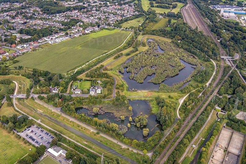 Aerial view, Dahlwiesenbach drainage ditch with overflow area east and west in the Alt-Scharnhorst district of Dortmund, Ruhr area, North Rhine-Westphalia, Germany, DE, Dortmund, Europe, aerial view, aerial photography, aerial photography, overview, bird's-eye view, overview