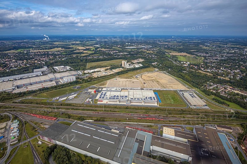 Aerial view, construction site with the new REWE logistics centre on Walzwerkstraße at the old Westfalenhütte in the Borsigplatz district of Dortmund, Ruhr area, North Rhine-Westphalia, Germany, construction area, building site, building plots, construction project, construction site, brownfield site, DE, Dortmund, Europe, commercial enterprises, commercial area, commercial area, commercial location, commercial use, industrial area, industrial location, logistics, logistics service, logistics service provider, logistics provider, logistics centre, aerial view, aerial photography, aerial photography, new construction, transport service, overview, bird's-eye view, overview