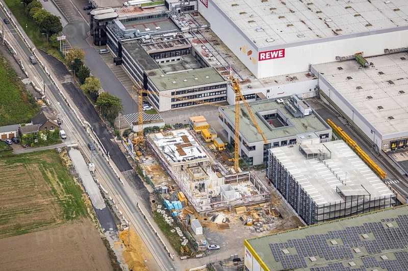 Aerial view, commercial area Brackeler Hellweg and construction site with new building in the district Asseln in Dortmund, Ruhr area, North Rhine-Westphalia, Germany, construction work, construction area, construction site, building plots, construction project, construction site, DE, Dortmund, Europe, commercial enterprises, commercial area, commercial park, commercial site, commercial use, industrial area, industrial site, aerial view, aerial photography, aerial photography, aerial photography, new building, overview, bird's eye view, birds-eyes view, overview