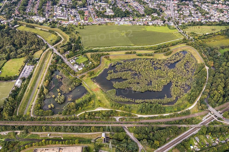 Aerial view, Dahlwiesenbach drainage ditch with overflow area east and west in the Alt-Scharnhorst district of Dortmund, Ruhr area, North Rhine-Westphalia, Germany, DE, Dortmund, Europe, aerial view, aerial photography, aerial photography, overview, bird's-eye view, overview
