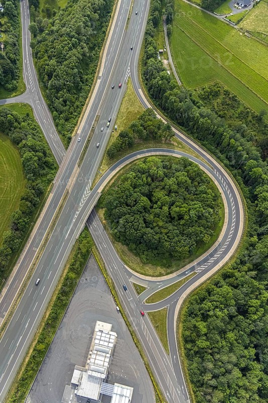 Aerial view, motorway junction Drolshagen, motorway A45 with petrol station and roundabout, Germinghausen, Drolshagen, Sauerland, North Rhine-Westphalia, Germany, motorway A45, DE, Europe, shapes and colours, aerial view, aerial photography, aerial photography, overview, bird's-eye view, overview