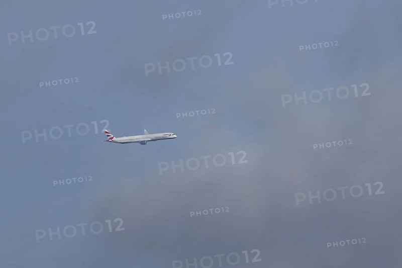 Boeing 787-9 Dreamliner jet passenger aircraft of British Airways airlines in flight in a blue sky, London, England, United Kingdom