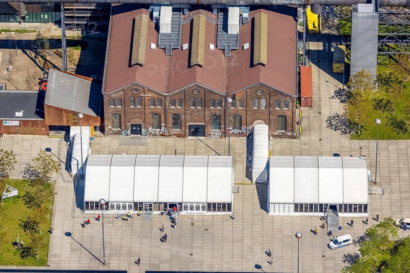 Aerial view, Phoenix-West industrial estate and local recreation area, Corona rapid test centre in the Warsteiner Music Hall, Hörde, Dortmund, Ruhr area, North Rhine-Westphalia, Germany, distance rule, Corona measures, Corona virus, Corona test centre, Covid-19, DE, Europe, hygiene measures, aerial view, aerial photography, aerial photography, overview, virus, bird's-eye view, tent, birds-eyes view, former Phoenix Hall, former blast furnace plant, overview