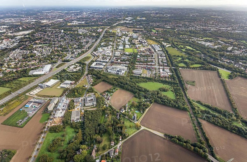 Technical University Dortmund Campus North and construction sites Im Weißen Feld at Brennaborstraße and Sebrathweg in the district Oespel in Dortmund, Ruhr area, North Rhine-Westphalia, Germany, motorway A40, construction work, construction area, construction site, building plots, construction project, Campus North, DE, Dortmund, Europe, distant view, green area technology park, aerial view, aerial photograph, aerial photography, aerial photography, new building, Sebrathweg, TU Dortmund, Dortmund University of Technology, overview, University of Dortmund, Verizon Germany, bird's-eye view, Weißes Feld, birds-eyes view, overview