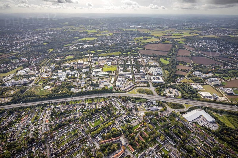 Aerial view of the TZDO - TechnologieZentrumDortmund GmbH, Technical University Dortmund Campus North with the Technology Centre and EMC Test North Rhine-Westphalia GmbH EMC Competence Centre as well as construction site for the CALEDO research centre next to the Faculty of Computer Science in the Oespel district of Dortmund, Ruhr area, North Rhine-Westphalia, Germany, A40 motorway, construction work, construction site, building plots, construction avenue, construction measure, construction project, construction site, education, educational institution, north campus, south campus, DE, Dortmund, Elmos Semiconductor SE, Emil-Figge-Straße, Europe, distant view, green area technology park, aerial view, aerial photograph, aerial photography, aerial photography, new building, TU Dortmund, Dortmund University of Technology, overview, University of Dortmund, bird's-eye view, overview