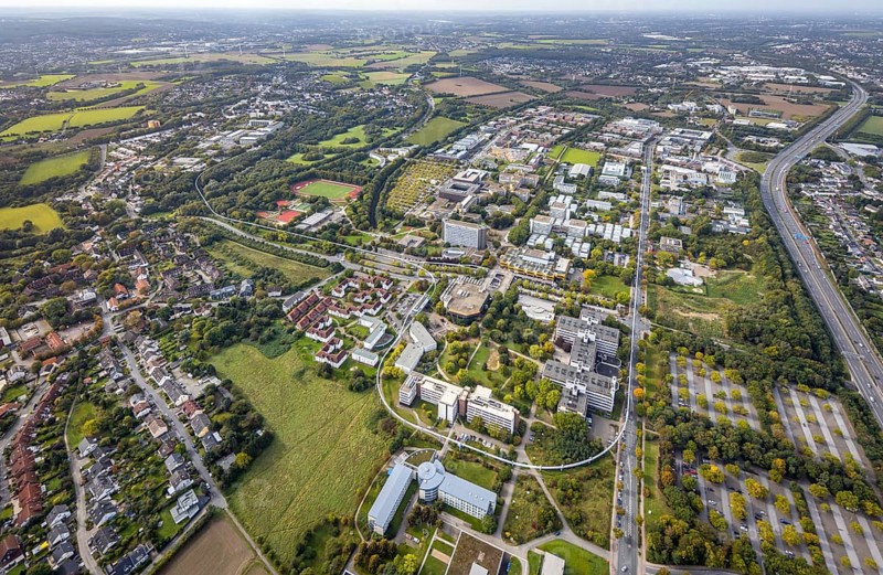 Aerial view of TZDO - TechnologieZentrumDortmund GmbH, Technical University Dortmund Campus North and Campus South in the district Oespel in Dortmund, Ruhr area, North Rhine-Westphalia, Germany, motorway A40, Campus North, DE, Dortmund, Europe, distant view, aerial view, aerial photograph, aerial photography, aerial photography, sports facility, TU Dortmund, Technical University Dortmund, overview, University of Dortmund, bird's eye view, birds-eyes view, overview