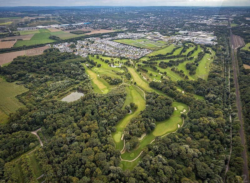 Aerial view, Royal Saint Barbara's Dortmund Golf Club and single-family house housing estate Brackeler Feld and BVB Borussia Dortmund training ground in the district Brackel in Dortmund, Ruhr area, North Rhine-Westphalia, Germany, DE, Dortmund, single-family houses, Europe, football pitch, golf, golf course, golf club, golf course, golf meadow, property tax, real estate, aerial view, aerial photography, aerial photography, sports, sports facilities, sports field, sports facility, overview, bird's eye view, residential area, residential area, residential buildings, residential quality, residential neighbourhood, housing estate, birds-eyes view, overview