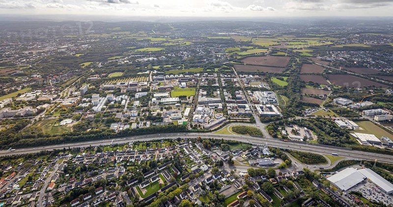 Aerial view of the TZDO - TechnologieZentrumDortmund GmbH, Technical University Dortmund Campus North with the Technology Centre and EMC Test North Rhine-Westphalia GmbH EMC Competence Centre as well as construction site for the CALEDO research centre next to the Faculty of Computer Science in the Oespel district of Dortmund, Ruhr area, North Rhine-Westphalia, Germany, A40 motorway, construction work, construction site, building plots, construction avenue, construction measure, construction project, construction site, education, educational institution, north campus, south campus, DE, Dortmund, Elmos Semiconductor SE, Emil-Figge-Straße, Europe, distant view, green area technology park, aerial view, aerial photograph, aerial photography, aerial photography, new building, TU Dortmund, Dortmund University of Technology, overview, University of Dortmund, bird's-eye view, overview