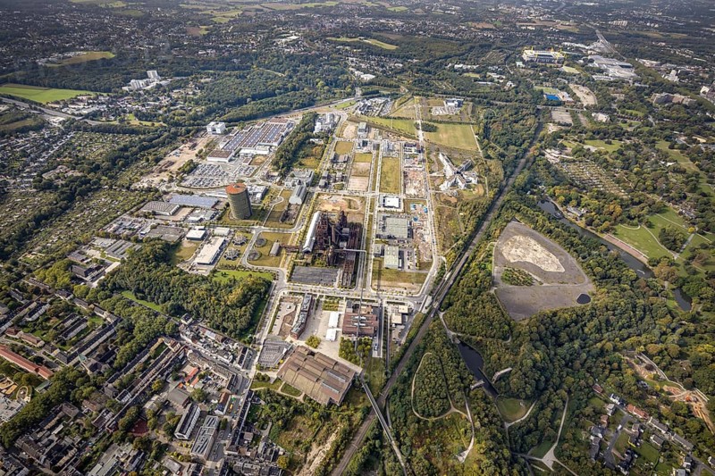 Phönix-West Areal and Hoesch-Gasometer as well as Wilo Park, BMW branch Dortmund, INTECH Die Industrieausrüster and Amprion GmbH Stromversorger in the district Hörde in Dortmund, Ruhr area, North Rhine-Westphalia, Germany, Amprion GmbH Stromversorger, DE, monument protection, Dortmund, Europe, commercial enterprises, commercial area, commercial area, commercial park, commercial location, commercial use, industrial area, industrial building, industrial location, innovation location, aerial view, aerial photograph, aerial photography, aerial photography, Phönix-West, overview, bird's-eye view, birds-eyes view, former blast furnace plant, overview