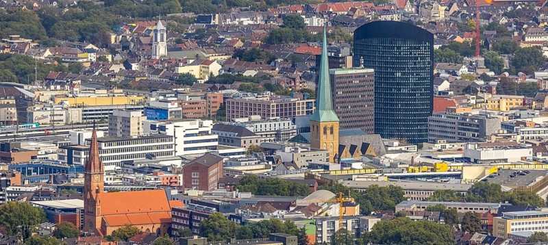 View of the city centre with the Church of Our Lady of the Holy Sepulchre, the Protestant Church of St. Peter, the Sparkasse Tower and the RWE Tower. Petri, Sparkassenhochhaus and RWE Tower in the City district of Dortmund, Ruhr area, North Rhine-Westphalia, Germany, place of worship, office tower, City, DE, Dortmund, Europe, religious community, place of worship, holy place, high-rise building, city centre, church, parish, denomination, RWE Vertrieb AG headquarters, aerial view, aerial photograph, aerial photography, aerial photography, local view, Petrikirche, RWE Tower, religion, religious site, skyline, townscape, city centre, overview, bird's-eye view, overview