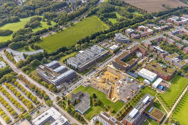 Aerial view of the TZDO - TechnologieZentrumDortmund GmbH, Technical University of Dortmund with the BioMedicine Centre BMZ and the Max Planck Institute of Molecular Physiology as well as the construction site for the CALEDO research centre next to the Faculty of Computer Science on Otto-cock-Straße in the Eichlinghofen district of Dortmund, Ruhr area, North Rhine-Westphalia, Germany, construction work, construction area, building site, building plots, construction project, building site, Campus North, Center for Advanced Liquid-Phase Engineering Dortmund (CALEDO), DE, Dortmund, Europe, aerial view, aerial photography, aerial photography, new building, TU Dortmund, Technical University Dortmund, overview, bird's-eye view, overview