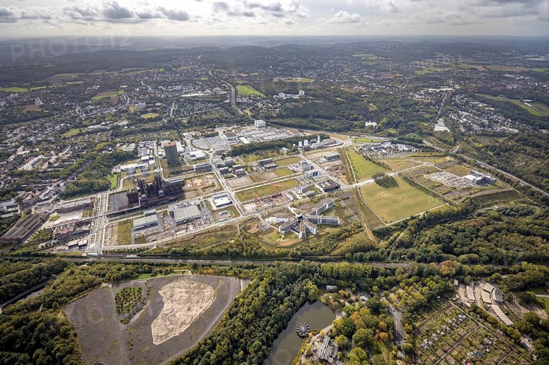 Phönix-West Areal and Hoesch-Gasometer as well as Wilo Park, BMW branch Dortmund, INTECH Die Industrieausrüster and Amprion GmbH Stromversorger in the district Hörde in Dortmund, Ruhr area, North Rhine-Westphalia, Germany, Amprion GmbH Stromversorger, DE, monument protection, Dortmund, Europe, commercial enterprises, commercial area, commercial area, commercial park, commercial location, commercial use, industrial area, industrial building, industrial location, innovation location, aerial view, aerial photograph, aerial photography, aerial photography, Phoenix-See, Phoenix-West, overview, bird's-eye view, birds-eyes view, former blast furnace plant, overview