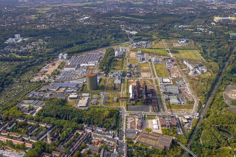 Phönix-West Areal and Hoesch-Gasometer as well as Wilo Park, BMW branch Dortmund, INTECH Die Industrieausrüster and Amprion GmbH Stromversorger in the district Hörde in Dortmund, Ruhr area, North Rhine-Westphalia, Germany, Amprion GmbH Stromversorger, DE, monument protection, Dortmund, Europe, commercial enterprises, commercial area, commercial area, commercial park, commercial location, commercial use, industrial area, industrial building, industrial location, innovation location, aerial view, aerial photograph, aerial photography, aerial photography, Phoenix-See, Phoenix-West, overview, bird's-eye view, birds-eyes view, former blast furnace plant, overview