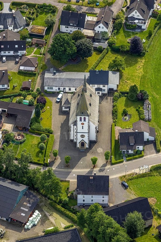 Aerial view, catholic church St. Antonius Einsiedler, Iseringhausen, Drolshagen, Sauerland, North Rhine-Westphalia, Germany, place of worship, DE, monument protection, Europe, religious community, place of worship, holy place, church, parish, denomination, aerial view, aerial photography, aerial photography, religion, religious site, overview, bird's-eye view, birds-eyes view, overview