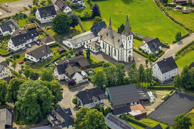 Aerial view, catholic church St. Antonius Einsiedler, Iseringhausen, Drolshagen, Sauerland, North Rhine-Westphalia, Germany, place of worship, DE, monument protection, Europe, religious community, place of worship, holy place, church, parish, denomination, aerial view, aerial photography, aerial photography, religion, religious site, overview, bird's-eye view, birds-eyes view, overview