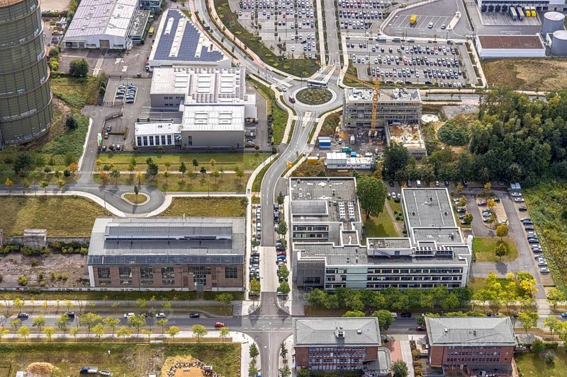 Phoenix-West area with company buildings MST Factory and ION-GAS GmbH on Konrad-Adenauer-Allee in the Hörde district of Dortmund, Ruhr area, North Rhine-Westphalia, Germany, Bartels Mikrotechnik GmbH, DE, Dortmund, Europe, commercial enterprises, commercial area, industrial estate, business park, commercial location, commercial use, industrial area, industrial building, industrial location, innovation location, aerial view, aerial photograph, aerial photography, aerial photography, Micronit GmbH, Phönix-West, overview, bird's-eye view, old factory building, birds-eyes view, former blast furnace plant, overview