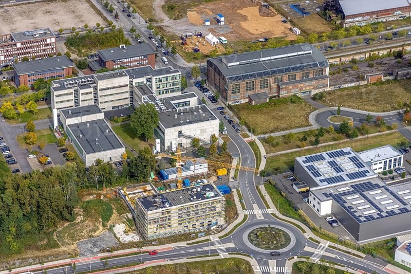Phönix-West area with company buildings MST Factory and ION-GAS GmbH on Konrad-Adenauer-Allee and construction site for new building at the roundabout Nortkirchenstraße Olof-palm tree-Straße in the district Hörde in Dortmund, Ruhr area, North Rhine-Westphalia, Germany, Bartels Mikrotechnik GmbH, construction work, construction area, construction site, building plots, construction project, construction site, DE, Dortmund, Europe, commercial enterprises, commercial area, commercial area, commercial park, commercial location, commercial use, industrial area, industrial building, industrial location, innovation location, aerial photograph, aerial photography, aerial photography, aerial photography, Micronit GmbH, new building, Phönix-West, overview, bird's eye view, old factory building, birds-eyes view, former blast furnace plant, overview, temicon GmbH