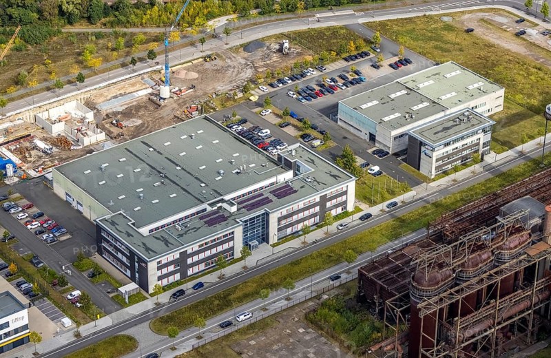 Phoenix-West area with company building Albonair and Centre for Production Technology at Carlo-Schmid-Allee in the district Hörde in Dortmund, Ruhr area, North Rhine-Westphalia, Germany, AAP-NDT GmbH, CTM-do GmbH, DE, Dortmund, Europe, commercial enterprises, commercial area, industrial area, commercial park, commercial location, commercial use, industrial area, industrial building, industrial location, innovation location, aerial view, aerial photograph, aerial photography, aerial photography, ORONTEC GmbH, Phönix-West, overview, bird's-eye view, birds-eyes view, former blast furnace plant, overview