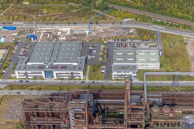 Phoenix-West area with company building Albonair and Centre for Production Technology at Carlo-Schmid-Allee in the district Hörde in Dortmund, Ruhr area, North Rhine-Westphalia, Germany, AAP-NDT GmbH, CTM-do GmbH, DE, Dortmund, Europe, commercial enterprises, commercial area, industrial area, commercial park, commercial location, commercial use, industrial area, industrial building, industrial location, innovation location, aerial view, aerial photograph, aerial photography, aerial photography, ORONTEC GmbH, Phönix-West, overview, bird's-eye view, birds-eyes view, former blast furnace plant, overview