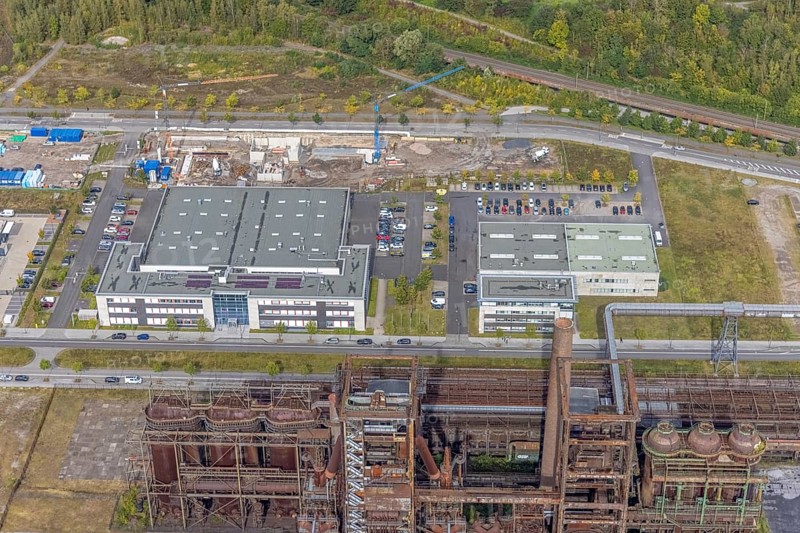 Phoenix-West area with company building Albonair and Centre for Production Technology at Carlo-Schmid-Allee in the district Hörde in Dortmund, Ruhr area, North Rhine-Westphalia, Germany, AAP-NDT GmbH, CTM-do GmbH, DE, Dortmund, Europe, commercial enterprises, commercial area, industrial area, commercial park, commercial location, commercial use, industrial area, industrial building, industrial location, innovation location, aerial view, aerial photograph, aerial photography, aerial photography, ORONTEC GmbH, Phönix-West, overview, bird's-eye view, birds-eyes view, former blast furnace plant, overview