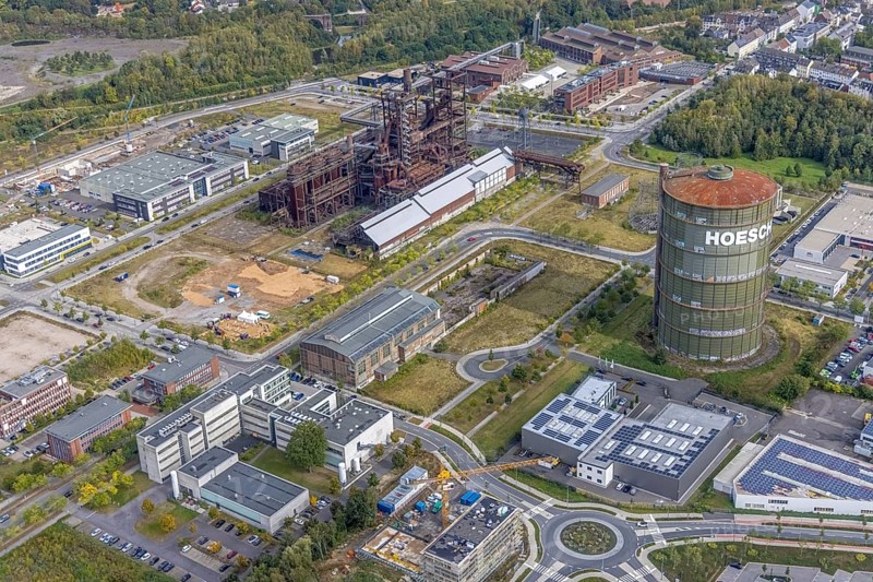 Phönix-West area and Hoesch-Gasometer and blast furnace plant as well as KIS Antriebstechnik GmbH with solar roof and company building Konrad-Adenauer-Allee with old factory building in the district Hörde in Dortmund, Ruhr area, North Rhine-Westphalia, Germany, Albonair, Bartels Mikrotechnik GmbH, DE, Dortmund, Europe, commercial enterprises, commercial area, industrial area, industrial park, commercial location, commercial use, ION-GAS GmbH, industrial area, industrial building, industrial location, innovation location, aerial view, aerial photograph, aerial photography, aerial photography, MST Factory, Micronit GmbH, Phönix-West, overview, bird's eye view, centre for production technology, birds-eyes view, former blast furnace plant, overview