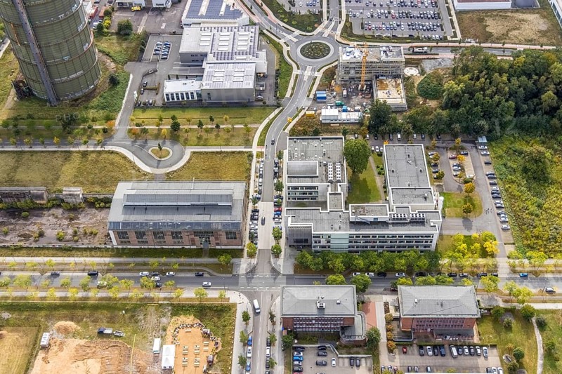 Phönix-West area with company building MST Factory and ION-GAS GmbH on Konrad-Adenauer-Allee and construction site for new building at the roundabout Nortkirchenstraße Olof-palm tree-Straße in the district Hörde in Dortmund, Ruhr area, North Rhine-Westphalia, Germany, Bartels Mikrotechnik GmbH, construction work, construction area, construction site, building plots, construction project, construction site, DE, Dortmund, Europe, commercial enterprises, commercial area, commercial park, commercial location, commercial use, ION-GAS GmbH, industrial area, industrial building, industrial location, innovation location, aerial view, aerial photograph, aerial photography, aerial photography, MST Factory, Micronit GmbH, new building, Phönix-West, overview, bird's eye view, old factory building, birds-eyes view, former blast furnace plant, overview, temicon GmbH