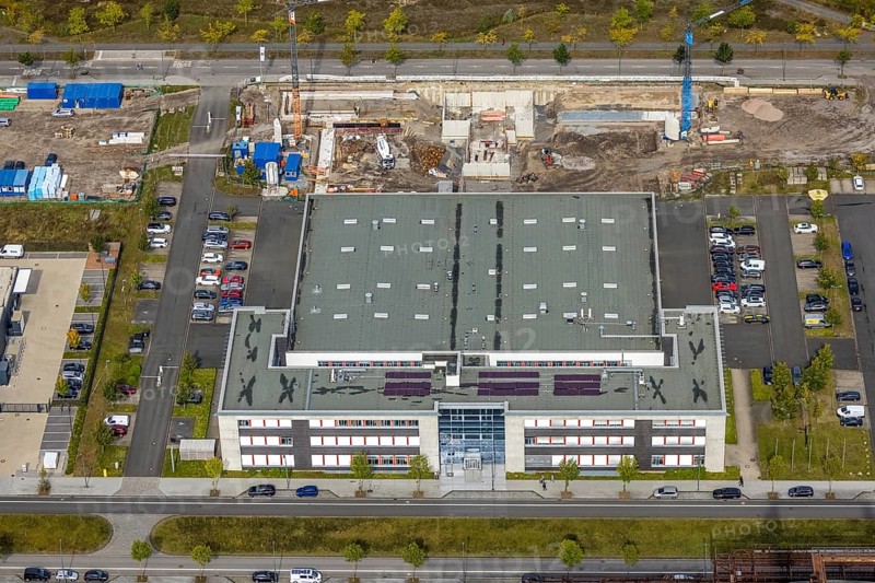 Phönix-West area with company building Centre for Production Technology on Carlo-Schmid-Allee in the Hörde district of Dortmund, Ruhr area, North Rhine-Westphalia, Germany, AAP-NDT GmbH, CTM-do GmbH, DE, Dortmund, Europe, commercial enterprises, commercial area, industrial estate, business park, commercial location, commercial use, industrial area, industrial building, industrial location, innovation location, aerial view, aerial photograph, aerial photography, aerial photography, ORONTEC GmbH, Phönix-West, overview, bird's-eye view, birds-eyes view, former blast furnace plant, overview