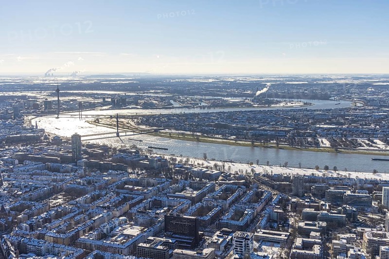 Aerial view, river Rhine with Oberkasseler Brücke, Rheinkniebrücke and Rheinturm, Altstadt, Düsseldorf, Rhineland, North Rhine-Westphalia, Germany, bridge, DE, Europe, river Rhine, aerial view, aerial photography, aerial photography, snow, tower, overview, bird's eye view, winter, birds-eyes view, overview