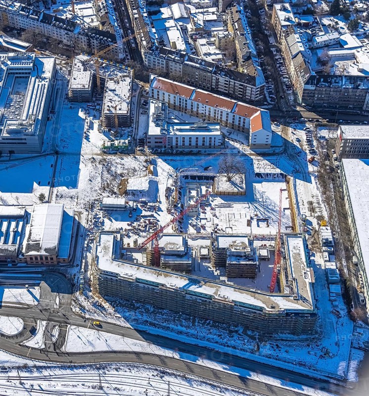 Aerial view, construction site of the new Centre for Digitisation and Digitality (ZDD) on the campus of Düsseldorf University of Applied Sciences, Derendorf, Düsseldorf, Rhineland, North Rhine-Westphalia, Germany, construction work, construction area, building site, building plots, construction project, construction site, DE, Elfriede Bial Straße, Europe, aerial photograph, aerial photography, aerial photography, new building, Rose Ausländer Straße, snow, overview, bird's-eye view, winter, birds-eyes view, overview