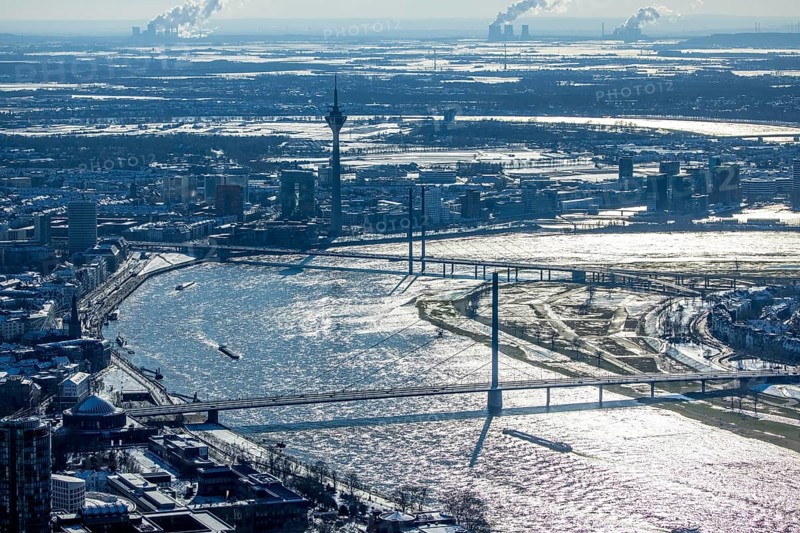 Aerial view, river Rhine with Oberkasseler Brücke, Rheinkniebrücke and Rheinturm, Altstadt, Düsseldorf, Rhineland, North Rhine-Westphalia, Germany, bridge, DE, Europe, river Rhine, aerial view, aerial photography, aerial photography, snow, tower, overview, bird's eye view, winter, birds-eyes view, overview
