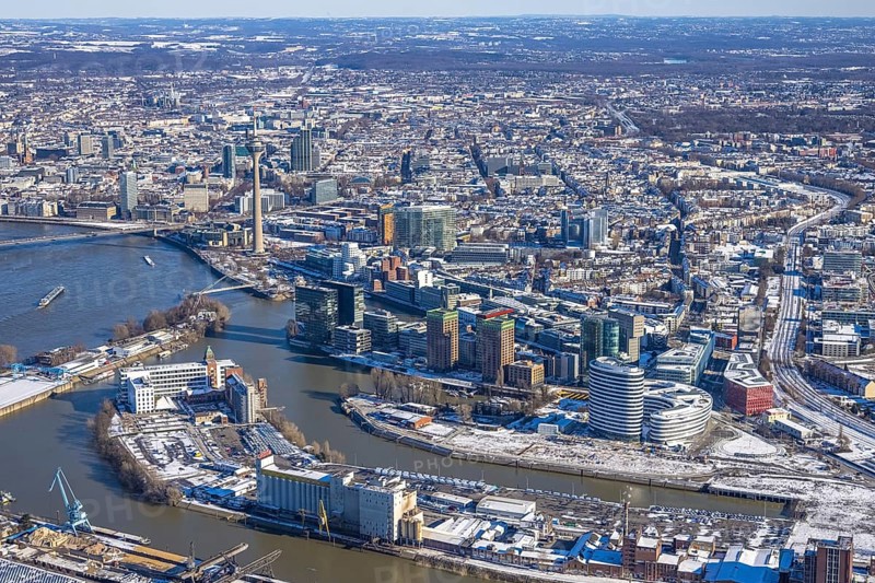 Aerial view, media harbour with Rhine Tower, harbour, Düsseldorf, Rhineland, North Rhine-Westphalia, Germany, office use, DE, Europe, commercial, commercial enterprises, commercial area, commercial park, commercial location, commercial use, industry, industrial area, industrial location, logistics, aerial view, aerial photography, aerial photography, aerial photography, snow, tower, overview, bird's eye view, winter, birds-eyes view, overview