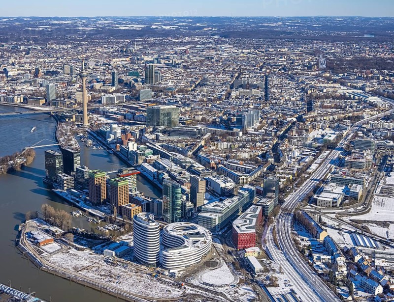 Aerial view, media harbour with Rhine Tower, harbour, Düsseldorf, Rhineland, North Rhine-Westphalia, Germany, office use, DE, Europe, commercial, commercial enterprises, commercial area, commercial park, commercial location, commercial use, industry, industrial area, industrial location, logistics, aerial view, aerial photography, aerial photography, aerial photography, snow, tower, overview, bird's eye view, winter, birds-eyes view, overview