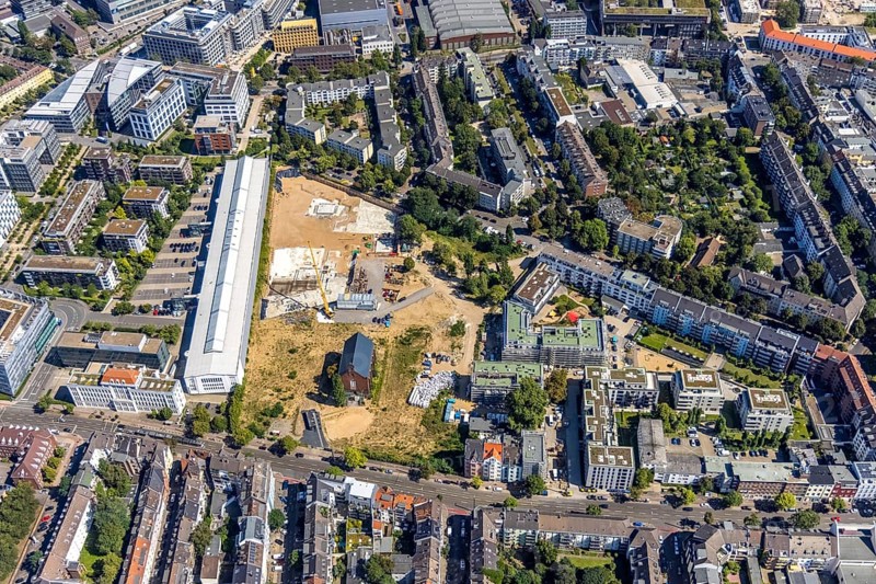 Aerial view, construction site Ulmer Höh and new construction city quarter maxfrei in the district Derendorf in Düsseldorf, Rhineland, North Rhine-Westphalia, Germany, construction work, construction area, building site, building plots, construction project, construction site, DE, Düsseldorf, Europe, property tax, real estate, aerial view, aerial photography, aerial photography, new construction, Ulmer Höh project, overview, bird's-eye view, residential complex, residential area, residential buildings, residential quality, residential neighbourhood, housing estate, birds-eyes view, former prison, overview