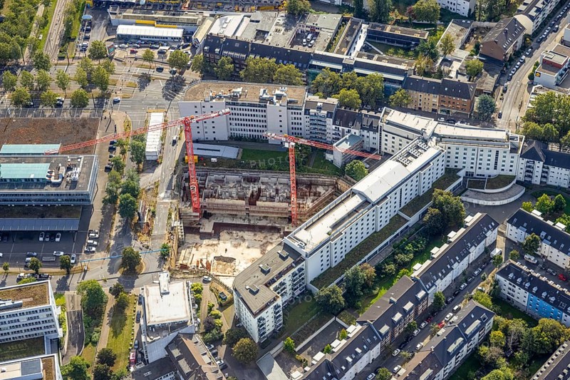 Aerial view, construction site on Mercedesstraße with new construction of an office and residential complex in the Düsseltal district of Düsseldorf, Rhineland, North Rhine-Westphalia, Germany, construction work, construction, construction area, construction site, building plots, construction crane, construction project, construction site, CG Gruppe AG, DE, Düsseldorf, development, Europe, commercial buildings, property tax, high-rise buildings, real estate, capacity requirements, aerial view, aerial photography, aerial photography, new construction, overview, bird's-eye view, residential complex, living and working, residential area, residential buildings, birds-eyes view, overview