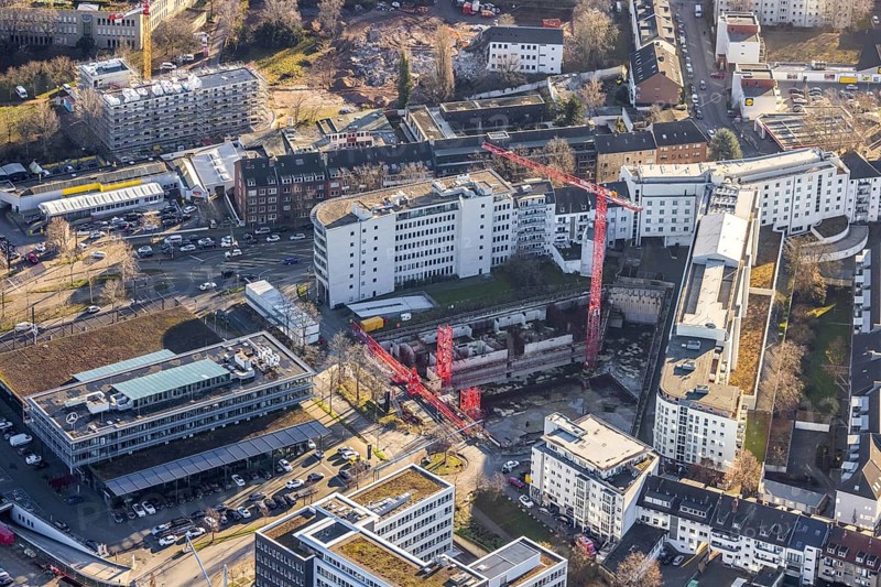 Aerial view, construction site at the corner of Mercedesstraße and Münsterstraße with new construction of an office and residential complex in the Düsseltal district of Düsseldorf, Rhineland, North Rhine-Westphalia, Germany, construction work, building, construction area, building site, building plots, construction crane, construction project, construction site, CG Gruppe AG, DE, Düsseldorf, development, Europe, commercial buildings, property tax, real estate, capacity requirements, aerial photograph, aerial photography, aerial photography, new construction, overview, bird's-eye view, residential complex, living and working, residential area, residential buildings, birds-eyes view, overview