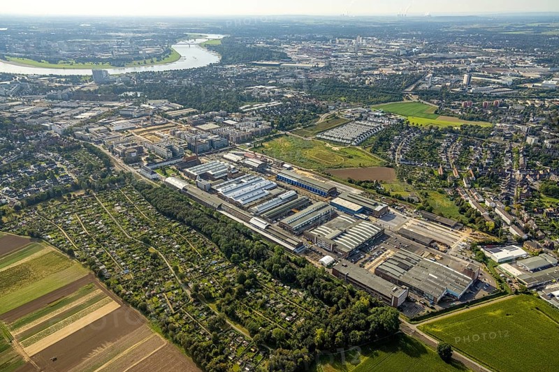 Aerial view, Areal Böhler commercial area and residential area VIERZIG549 as well as residential area Unter der Mühle in the district Büderich in Meerbusch, Rhineland, North Rhine-Westphalia, Germany, DE, Düsseldorf, Europe, shapes and colours, commercial enterprises, commercial area, commercial park, commercial location, commercial use, property tax, real estate, industrial area, industrial building, industrial site, aerial view, aerial photography, aerial photography, Meerbusch, overview, bird's-eye view, residential area, residential area, residential buildings, residential quality, residential neighbourhood, housing estate, birds-eyes view, overview