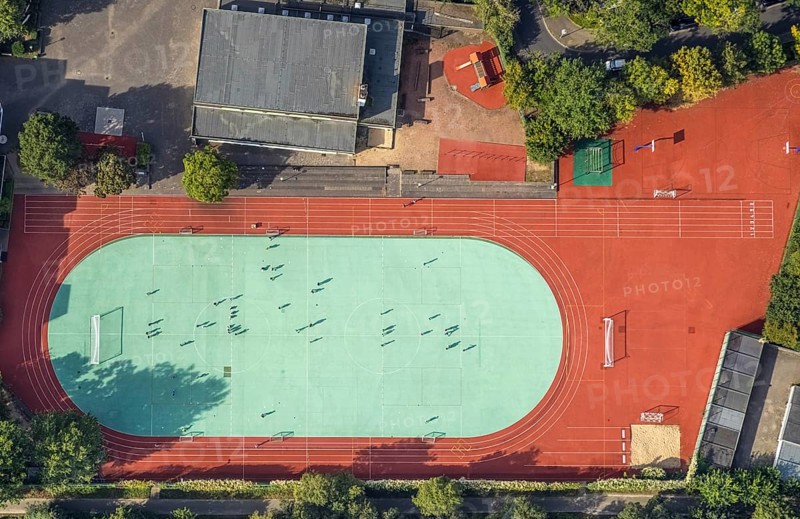 Aerial view, sports activities on the sports field at the Japanese International School in the Oberkassel district of Düsseldorf, Rhineland, North Rhine-Westphalia, Germany, DE, Düsseldorf, Europe, shapes and colours, football pitch, aerial view, aerial photography, aerial photography, sports, sports facilities, sports field, sports facility, overview, bird's-eye view, overview