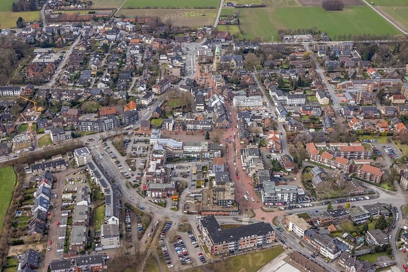Aerial view, construction site new building project Kirchhellener arcades at Schulstraße at Alter Markt, corner Kirchstraße, St. Johannes Kirche Hauptstraße, Bottrop-Kirchhellen, Ruhr area, North Rhine-Westphalia, Germany, construction work, construction area, construction site, building plots, construction project, construction site, DE, shopping street, Europe, property tax, Hans Büning Platz, real estate, aerial view, aerial photography, aerial photography, new construction, overview, bird's eye view, living and life, residential area, residential buildings, birds-eyes view, overview