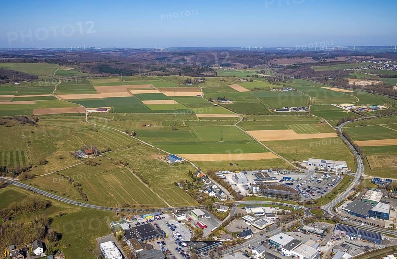 Aerial view, commercial area Möhnestraße, Brilon, Sauerland, North Rhine-Westphalia, Germany, DE, Europe, distant view, commercial enterprises, commercial area, commercial area, commercial location, commercial use, industrial area, industrial location, roundabout, roundabout, aerial photograph, aerial photography, aerial photography, mosaic form, overview, bird's-eye view, meadows and fields, birds-eyes view, overview