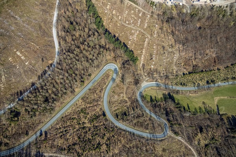 Aerial view, Bilsteinhalde, serpentines, forest dieback, hairpin bend, motorbike route, Gudenhagen, Brilon, Sauerland, North Rhine-Westphalia, Germany, DE, Europe, aerial view, aerial photography, aerial photography, road traffic, overview, bird's-eye view, forest, forest area, forest damage, birds-eyes view, overview