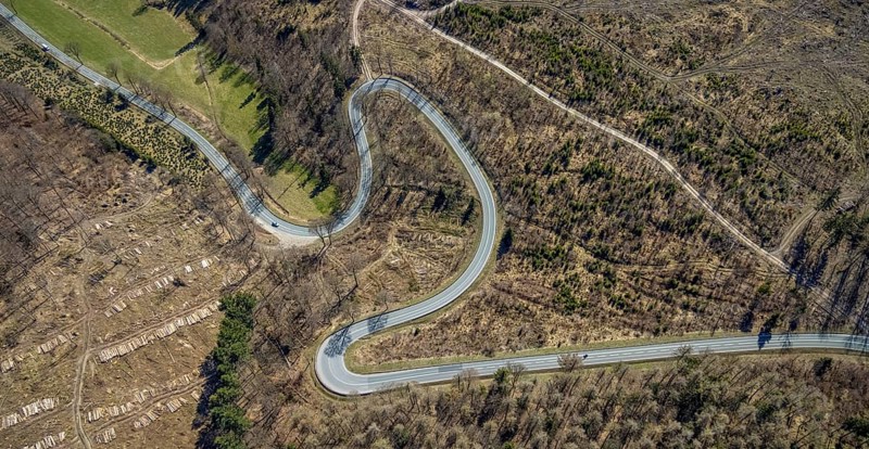 Aerial view, Bilsteinhalde, serpentines, forest dieback, hairpin bend, motorbike route, Gudenhagen, Brilon, Sauerland, North Rhine-Westphalia, Germany, DE, Europe, aerial view, aerial photography, aerial photography, road traffic, overview, bird's-eye view, forest, forest area, forest damage, birds-eyes view, overview
