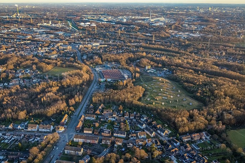 Aerial view, Recycling yard Donnerberg and solar park with local view in the district south in Bottrop, Ruhr area, North Rhine-Westphalia, Germany, Bottrop, DE, Europe, commercial enterprises, commercial area, commercial location, commercial use, industrial area, industrial location, aerial view, aerial photography, aerial photography, photovoltaics, photovoltaic plant, Reifen Stiebling, solar, solar plant, solar energy, solar park, overview, bird's eye view, ZweiradCenter Rück, birds-eyes view, overview