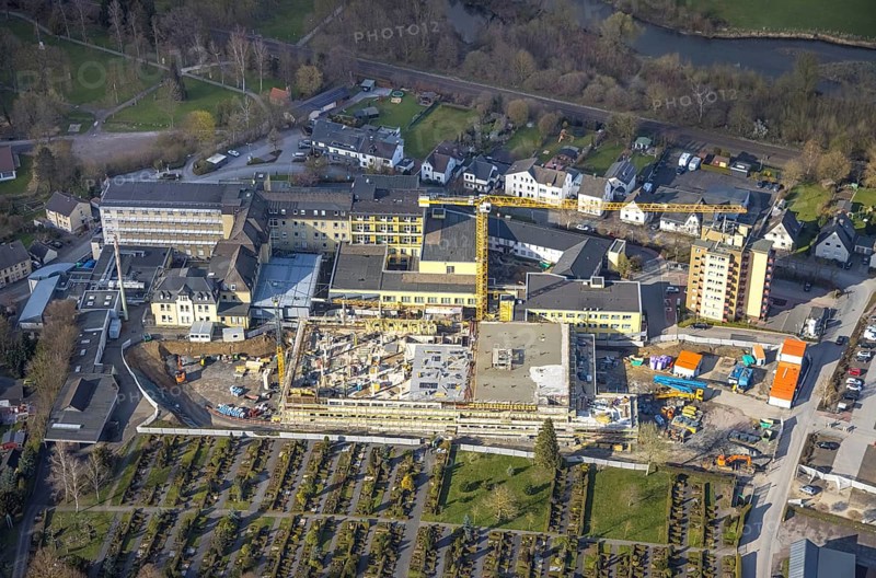 Aerial view, construction site and new building at Hochsauerland Clinic, Hüsten, Arnsberg, Sauerland, North Rhine-Westphalia, Germany, construction work, construction area, construction site, building plots, construction crane, construction measure, construction project, construction site, DE, Europe, healthcare, Hochsauerlandkreis, hospital, clinic, clinic centre, hospital, aerial view, aerial photography, aerial photography, medical facility, medical aid, emergency service, overview, bird's eye view, birds-eyes view, overview, medical care