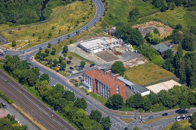 Aerial view, construction site and new construction of the Hagelstein rescue station next to the Arnsberg police station - Police Station West, Hüsten, Arnsberg, Sauerland, North Rhine-Westphalia, Germany, eye of the law, construction work, construction area, construction site, building plots, construction project, construction project, construction site, DE, Europe, Hochsauerlandkreis, aerial view, aerial photography, aerial photography, new building, law enforcement officer, police, police station, police station, rescue station, state authority, state power, overview, bird's-eye view, overview
