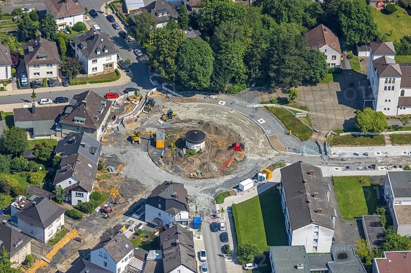 Aerial view, construction site and redesign of roundabout Pfarrer-Leo-Reiners-Platz, formerly Ehmsenplatz, Alter Holzweg, catholic St. Michael Church, Neheim, Arnsberg, Sauerland, North Rhine-Westphalia, Germany, place of worship, construction work, construction area, construction site, building plots, construction project, construction site, DE, Europe, religious community, place of worship, sacred site, Hochsauerlandkreis, church, church community, denomination, roundabout, roundabout, aerial view, aerial photography, aerial photography, religion, religious site, overview, bird's-eye view, birds-eyes view, overview